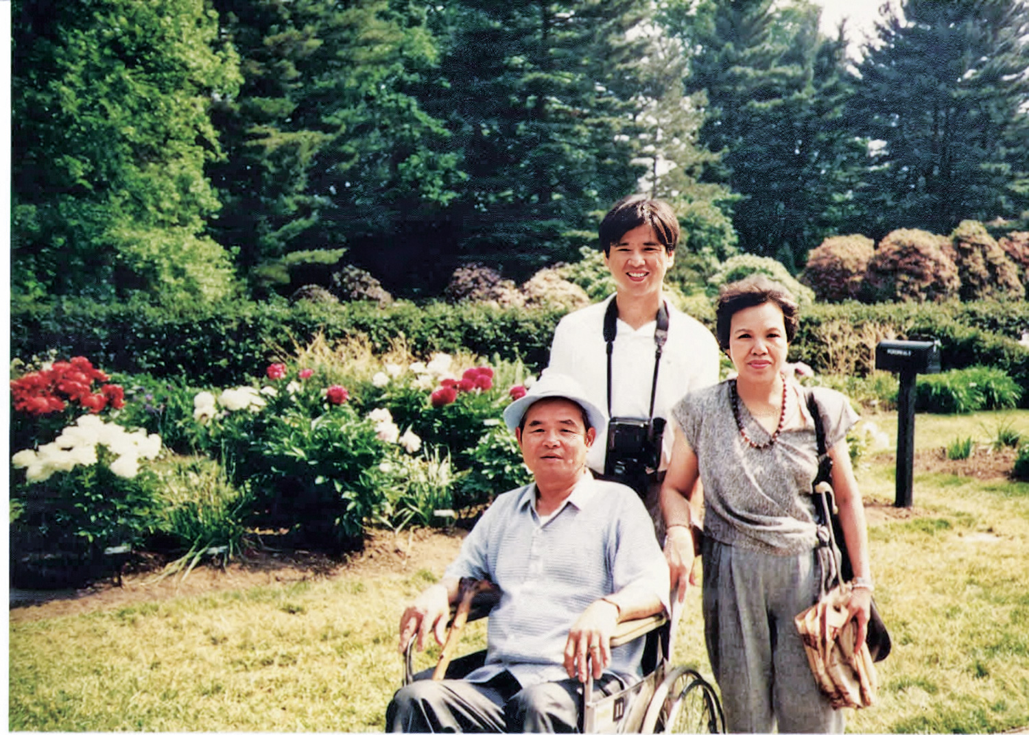 Jordan Hu with his parents in 1989 when he graduated from NJIT