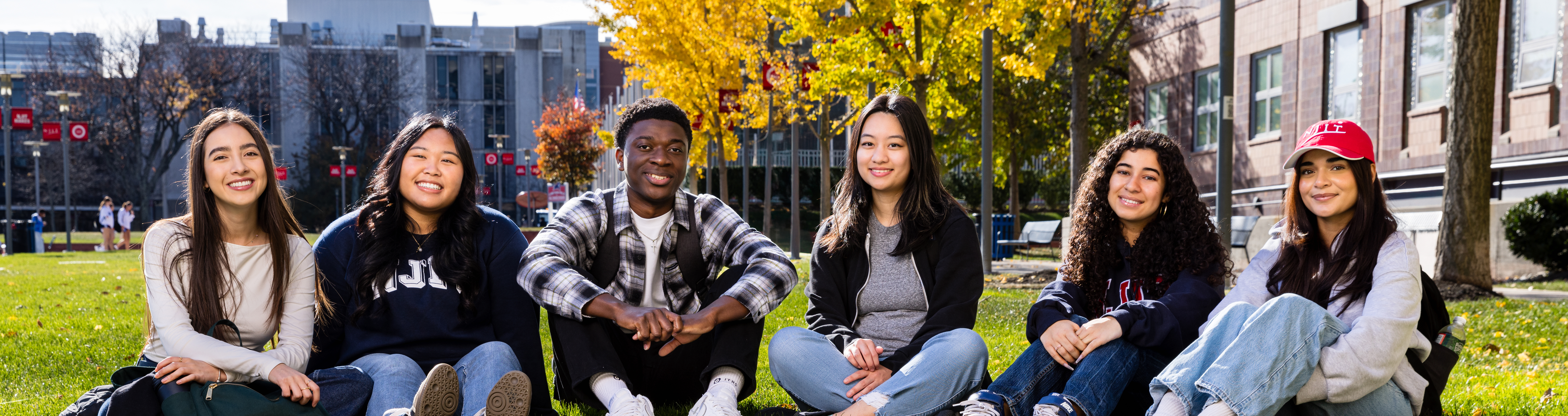 Students sitting on the grass