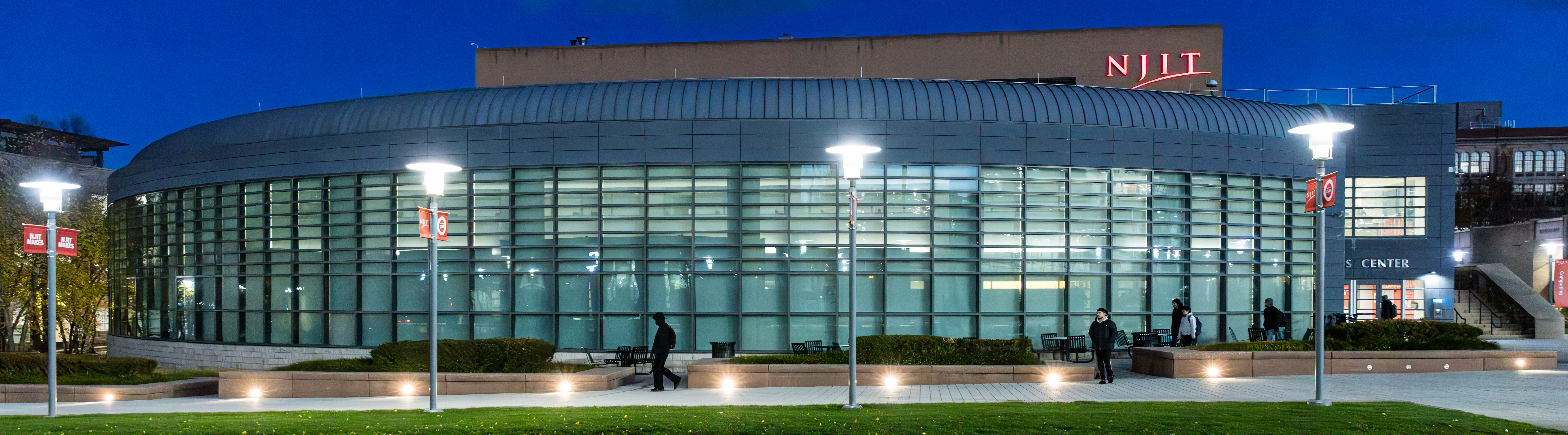 The outside of the campus center at night