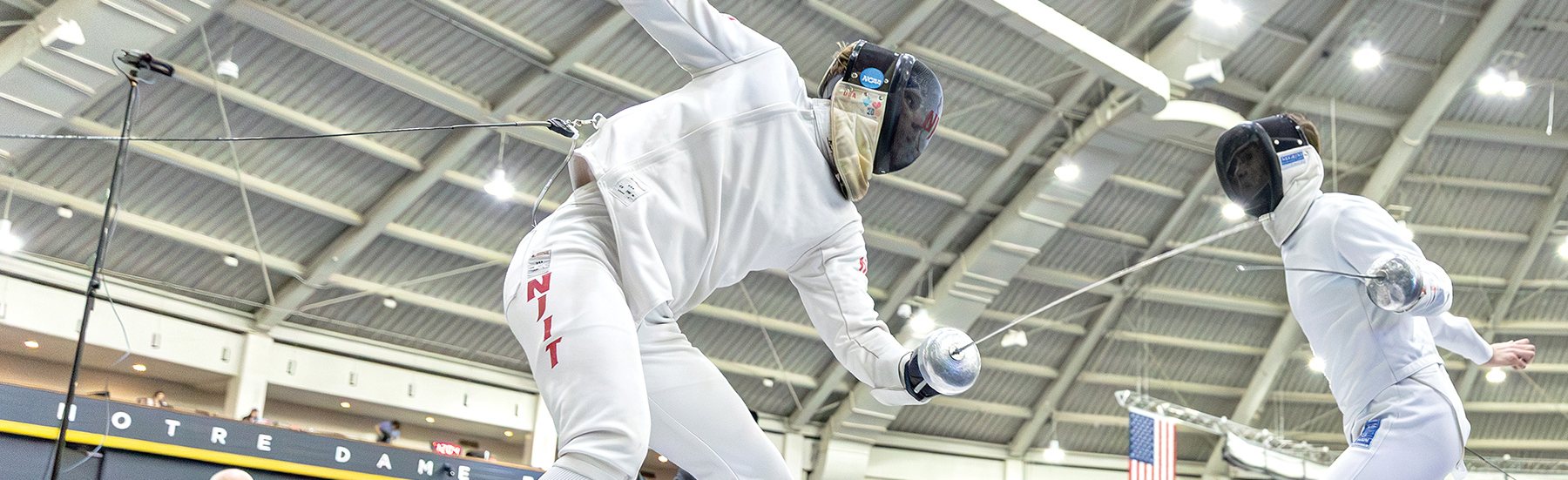 two students fencing