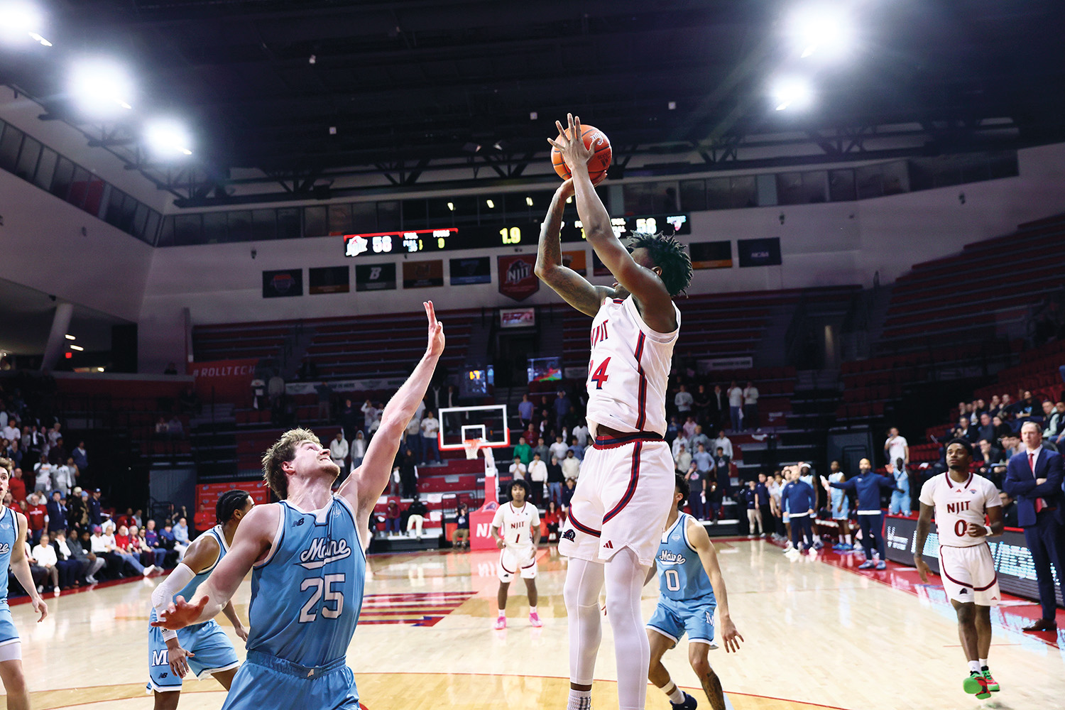 NJIT basketball player shooting the ball
