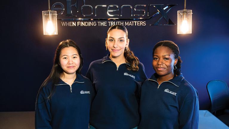 3 females wearing eForensics shirts