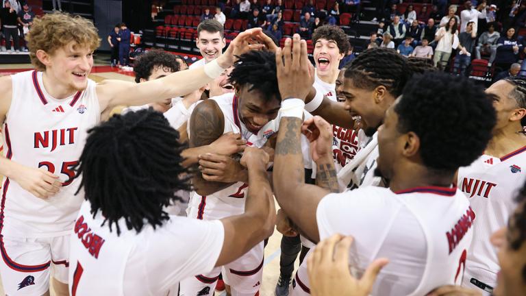NJIT basketball team celebrating a win