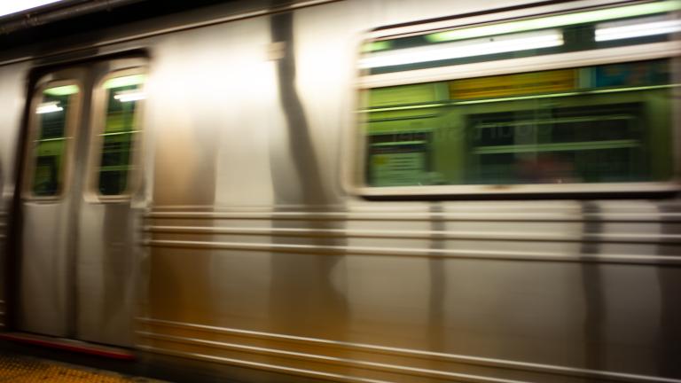 outside of a subway train car in motion