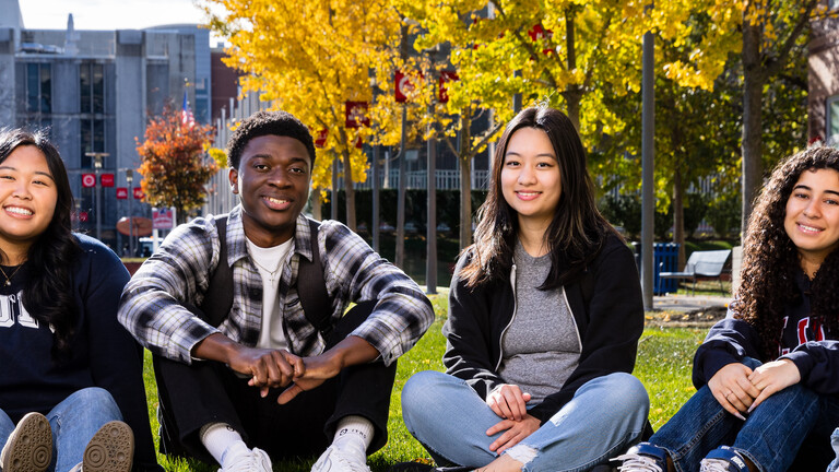 Students sitting on the grass