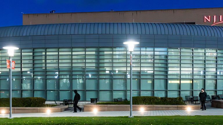 The outside of the campus center at night