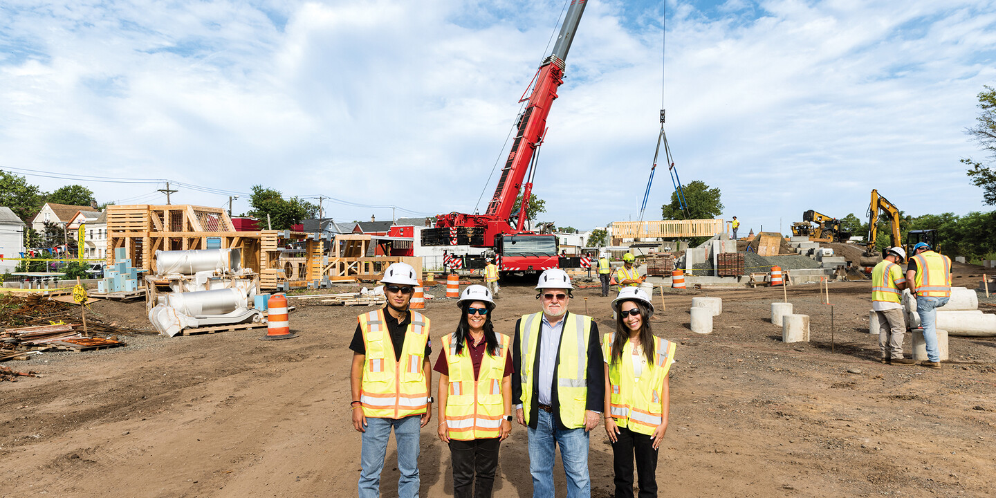 4 people in a construction zone