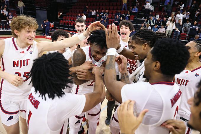 NJIT basketball team celebrating a win