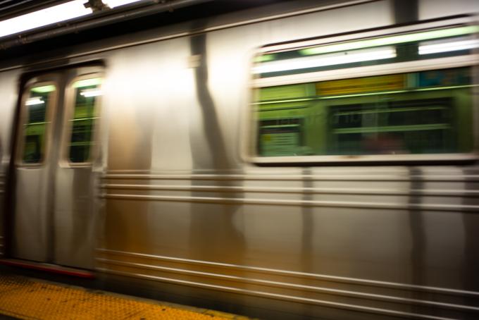 outside of a subway train car in motion
