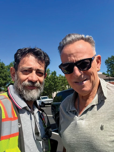 Juan Torres and Bruce Springsteen selfie photo at the construction site