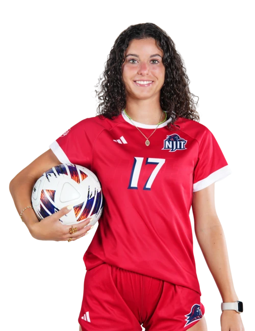 female soccer player holding a soccer ball